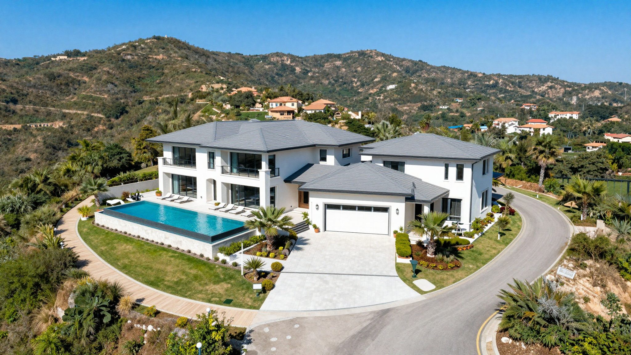 Aerial view of the estate and surrounding hills
